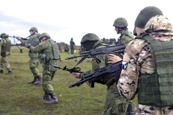 Russian Army recruits hold their weapons during a military training at a firing range in Donetsk on October 4.