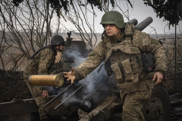 Ukrainian soldiers with the 71st Jaeger Brigade fire a M101 howitzer at Russian positions on the front line, near the city of Avdiivka in Ukraine’s Donetsk region.