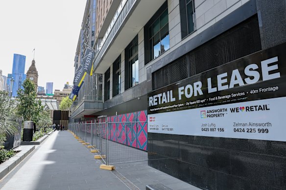 Shops remain boarded up at City Square with for lease signs nine months on from its reopening. 