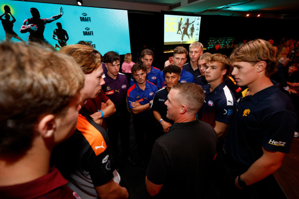  Tarkyn Lockyer, National AFL Academy Manager and coach speaks to the potential draftees before the first round.
