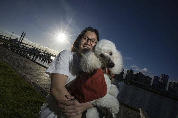 Angel Wang, 23, moved into the Docklands apartment she purchased for her and pooch Hong Bao three months ago.