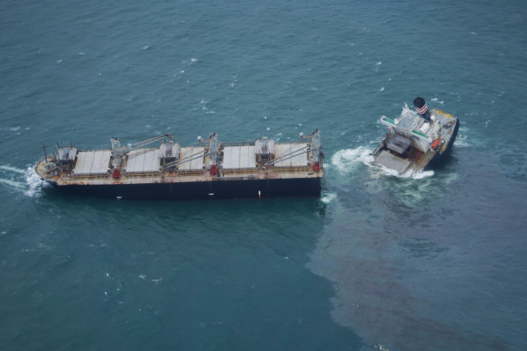 A large oil slick could be seen in waters surrounding the ship.