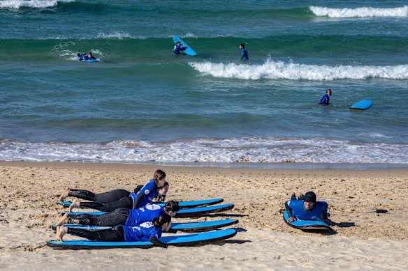 Let’s Go Surfing conducts lessons at Bondi Beach.