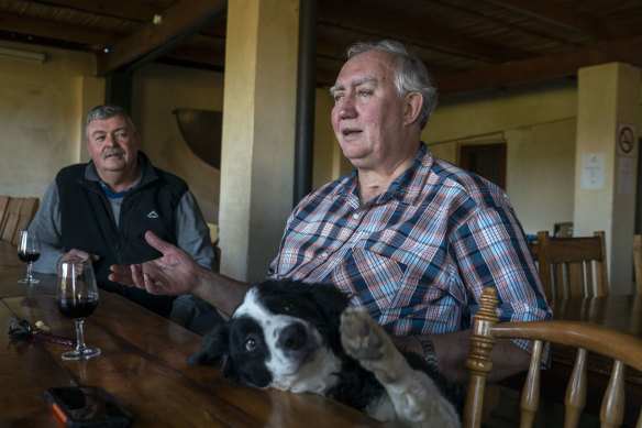 Wine farmer Stefan Smit drinks with friends at his Louiesenhof Wines farm which is next to the Kayamandi township outside Stellenbosch, South Africa, in 2018.