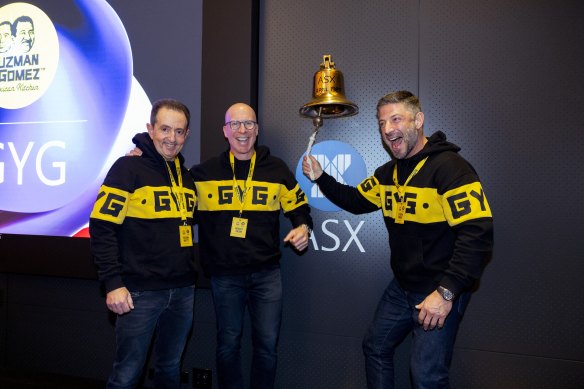 Guzman y Gomez co-founder Robert Hazan (centre) with co-CEOs Hilton Brett (left) and Steven Marks float the company on the ASX.