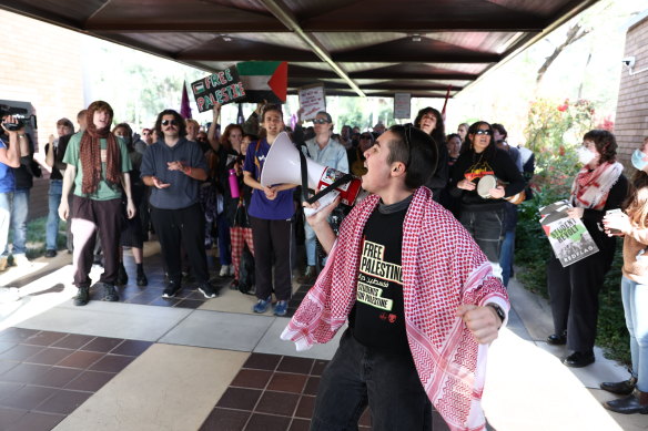 Protesters from the pro-Palestinian encampment march to the chancellor’s office at the Australian National University in Canberra last week.