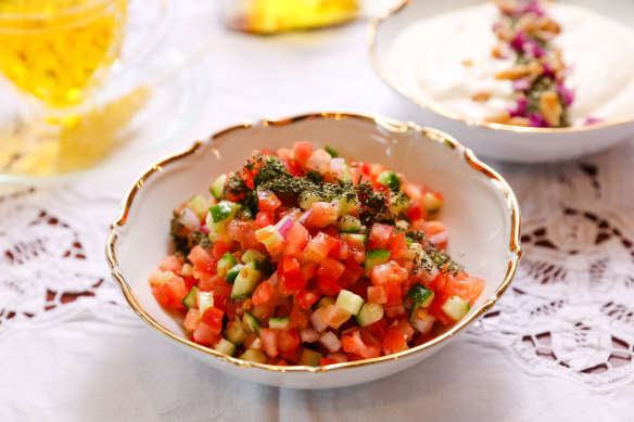 Shirazi salad with cucumber, onion and tomato.