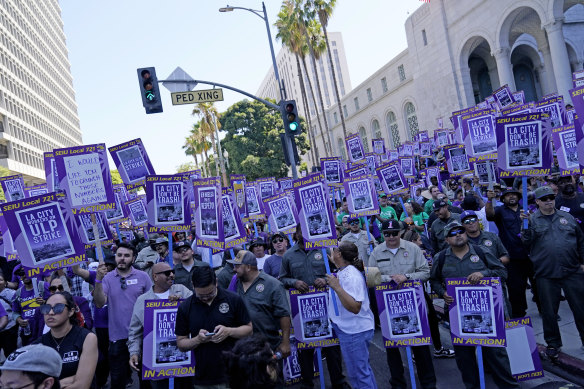 Thousands of Los Angeles city employees, including sanitation workers, engineers and traffic officers, walked off the job for a 24-hour strike alleging unfair labour practices. 