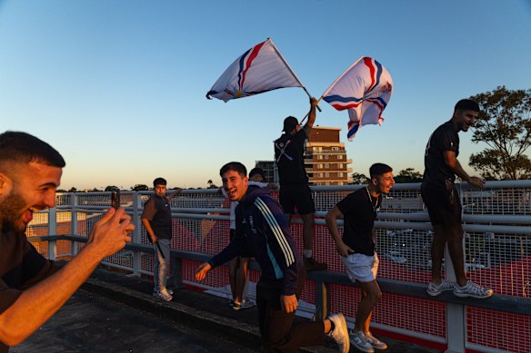 People take to the streets of Fairfield on Wednesday evening to celebrate Iraq’s win.