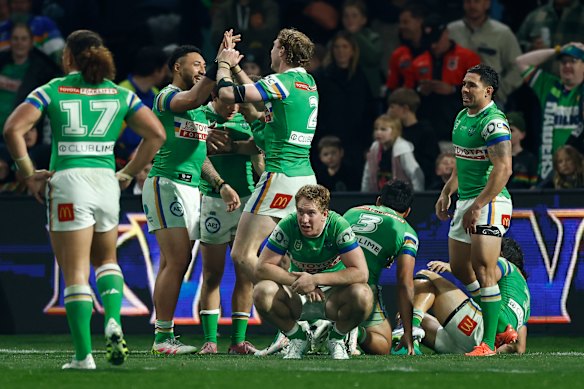 Canberra celebrate after Kaeo Weekes’ dramatic golden-point try.