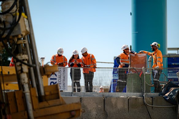 Workers in the soft-ground section of the M6 at Rockdale.