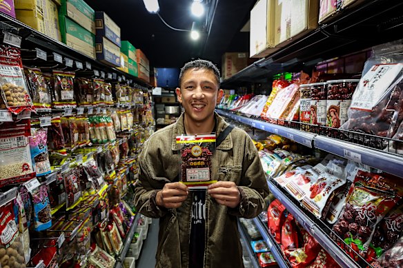 Pang in the fragrant spice aisle, with his Sichuan peppercorns of choice.