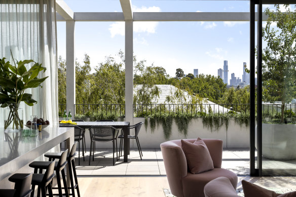 The living room in this Toorak home is upstairs, the bedrooms downstairs.