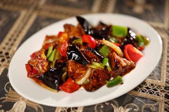 Fried eggplant with onion and capsicum is a sublime dish.