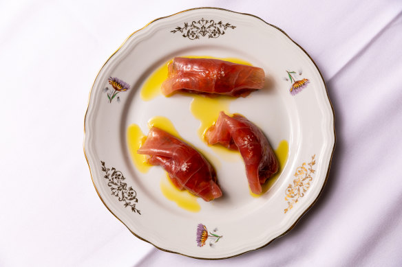 Tuna caponata, the raw tuna furled around a  fruity chip-chop of eggplant, tomatoes, celery, olives and capers.