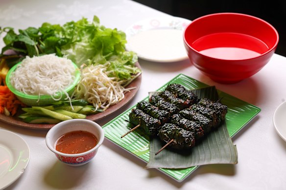 Bo la lop nuong than (beef wrapped in betel leaves).