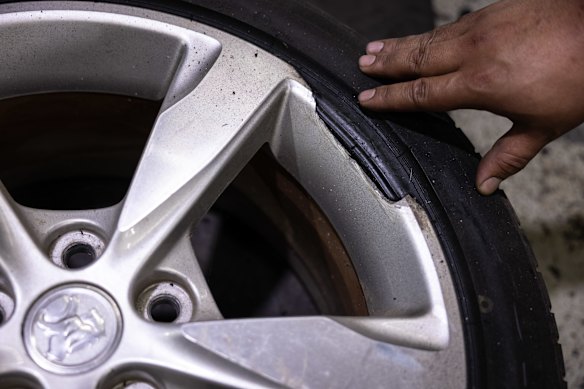 Tyre shop owner Sam Badra has seen plenty of pothole damage caused by Sydney’s roads. 