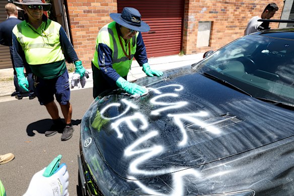 Antisemitic grafitti is cleaned from a car in Sydney’s eastern suburbs in February.