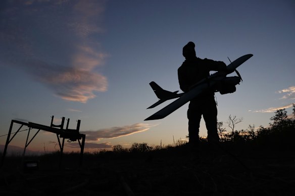 A Ukrainian serviceman launches a drone towards Russian positions at the front line in the Zaporizhzhia region last week.