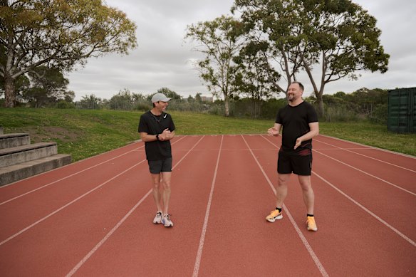 Hugh van Cuylenburg giving the writer a run-down on the 400-metre sprint.