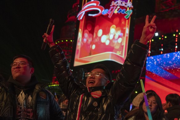 Revellers ring in the new year in Beijing.