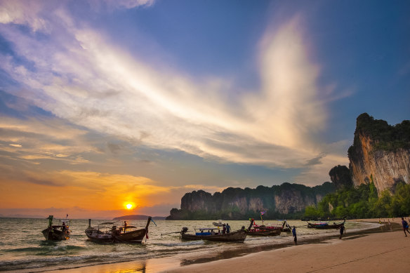 Guests can enjoy sunset strolls at Railay Beach.