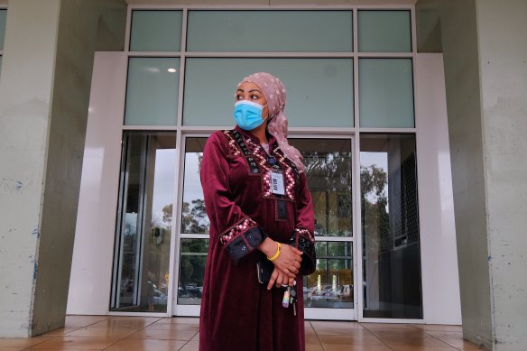 Ruth Eyakem, a resident of one of the  Flemington social housing towers, outside her building on Saturday.