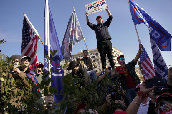 Supporters of President Donald Trump attend a pro-Trump march on Saturday in Washington. 