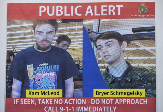 Security camera images of Kam McLeod, 19, and Bryer Schmegelsky, 18, are displayed during a news conference in suburban Vancouver. They're being sought in the murder of the Australian and American backpacker couple. 