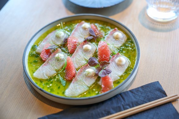 Koi Toy’s kingfish sashimi is dressed with pink grapefruit, coconut cream and yuzu kosho.