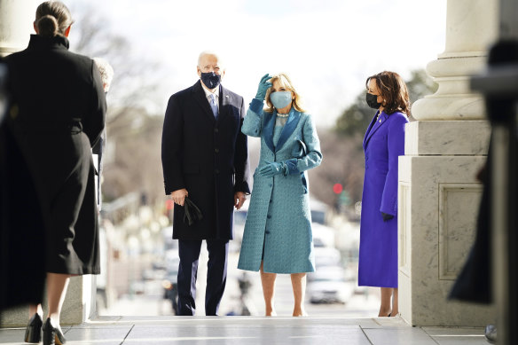 First lady Jill Biden's turquoise dress was designed by Markarian as a symbol of "trust, confidence and stability". 