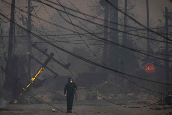 Intense winds cause the rapid spread of the wildfires.
