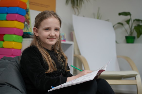 Varvara, 8, in a child-friendly space in a bunker underground in Dnipro, Ukraine