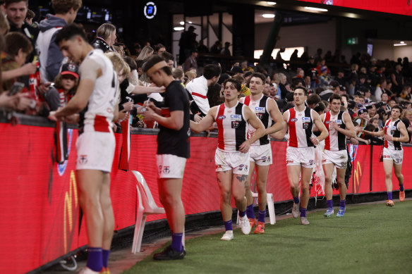 St Kilda players acknowledge their fans post-match.