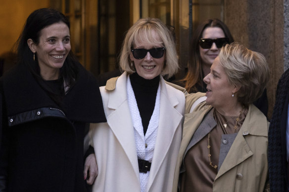 E. Jean Carroll leaves court after being awarded damages.
