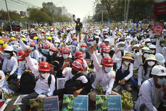 Protesters shout slogans during a protest against the military coup in Mandalay, Myanmar.