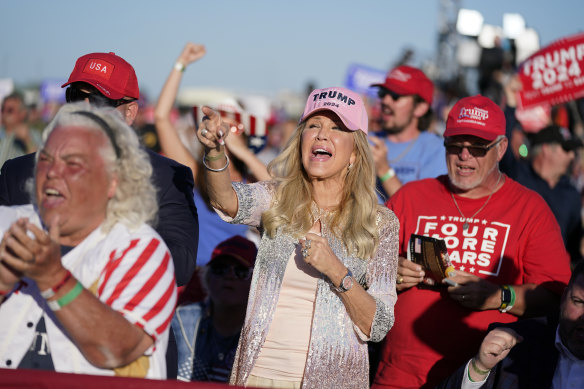 Supporters of former President Donald Trump cheer as he speaks at a campaign rally in Waco.