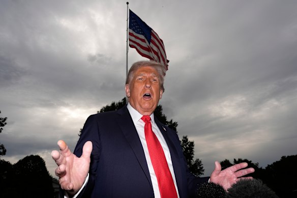 Trump speaks with reporters on the White House lawn. He criticised an Australian ABC reporter during the exchange.
