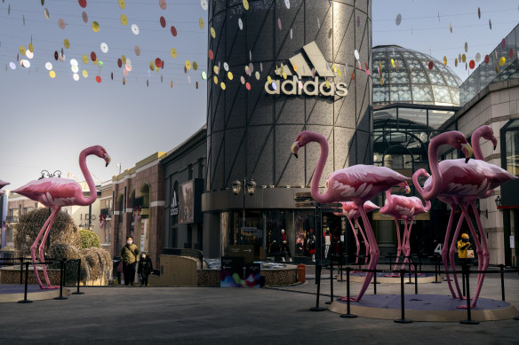 An Adidas store at a shopping mall in Beijing. There are 12,000 Adidas stores in China, up from 9000 in 2015, but the company said it expects China revenue to “decline significantly” this year. 