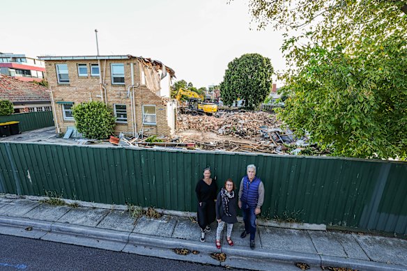 Nearby residents Nadine Parkington, Kathleen Munson and Hugh Hardy support an expansion of community housing, but fear plans for a six-storey building are too big and will impact the area.