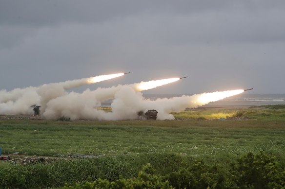 Rockets are launched from High Mobility Artillery Rocket System (HIMARS) during a military live-fire training in Taichung City, Taiwan, on Wednesday.