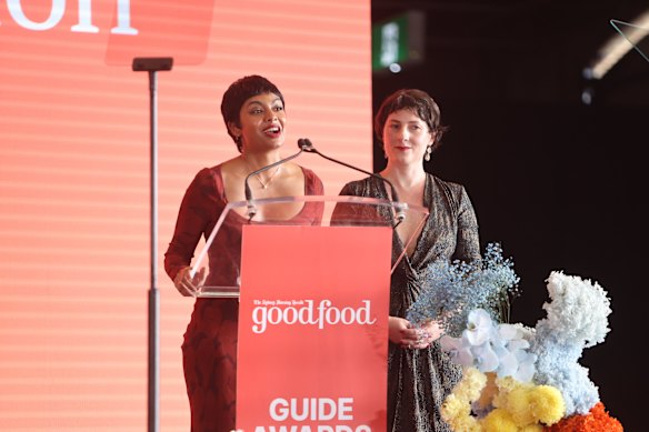 Women and Revolution members Saranya Kundasamy and Bridget Raffal, presenting the Cultural Change Champion award.