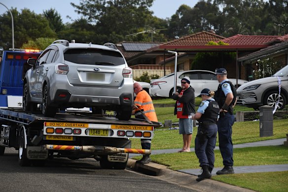 A gray car was taken from the scene in Rosemeadow on Sunday morning.