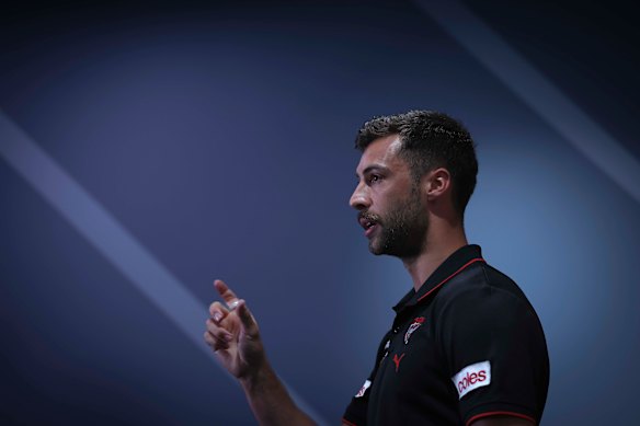 Essendon’s Kyle Langford faces the media.