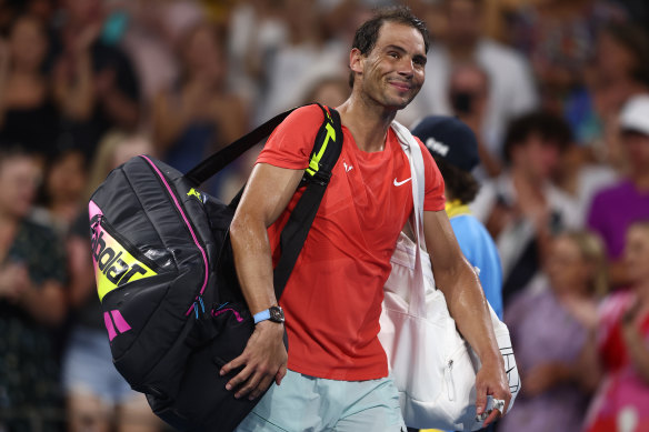 Rafael Nadal leaves the court after losing his match against Jordan Thompson.