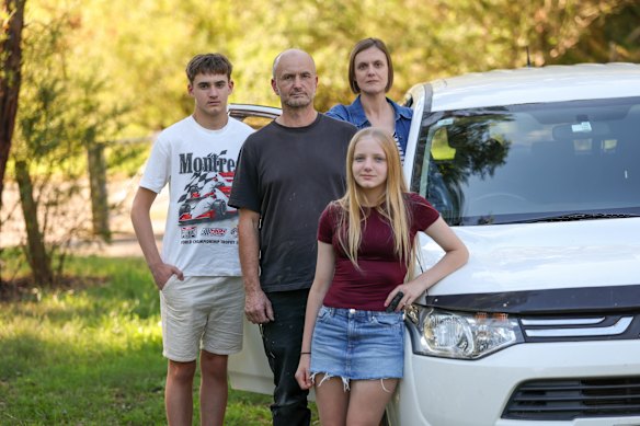 Andrea Cosentino and Malcolm Smith with their children Ben, 16, and Ella, 12. Andrea and her family have changed many of their driving habits. Ben is on his L-plates, is driving fewer hours and is catching the train more.