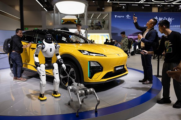 Chinese EV maker Changan deployed humanoid robots to help sell its Deepal S07 electric sedan at the Beijing Auto Show.