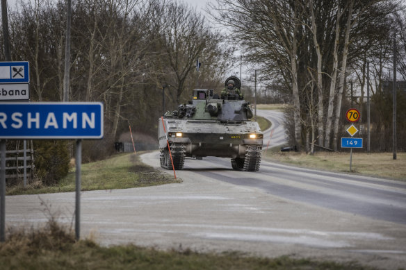 Members of Gotland’s Regiment patrol in a tank, on a road in Visby, northern Gotland, Sweden.