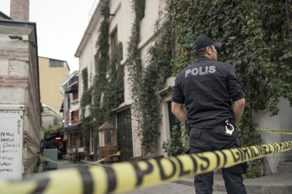 Police cordoned off the street after the death of James Le Mesurier.