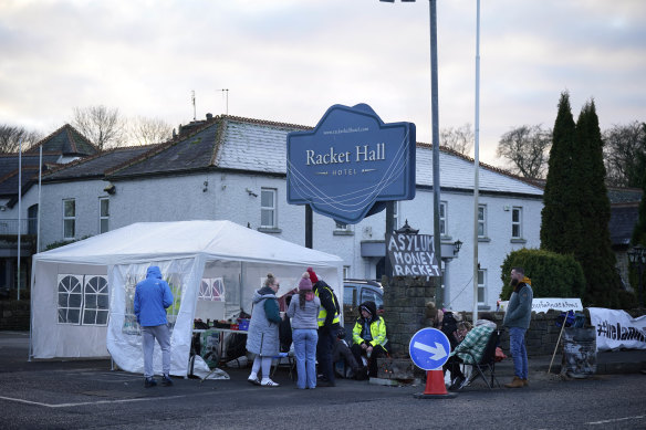 Protesters at the Racket Hall hotel.